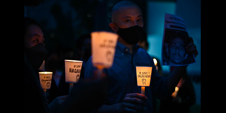 A candlelight vigil to protest the execution of Nagaenthran K. Dharmalingam in Singapore (Mohd Rasfan/AFP via Getty Images)